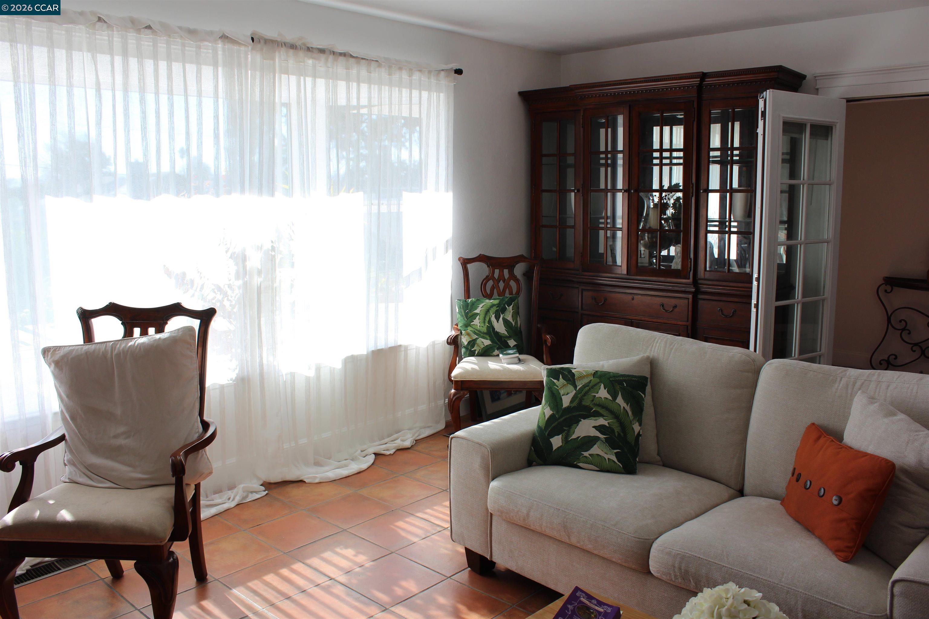 330 West Cypress Road Oakley, CA 94561 - Photo 12 of 59 a living room with furniture and a window