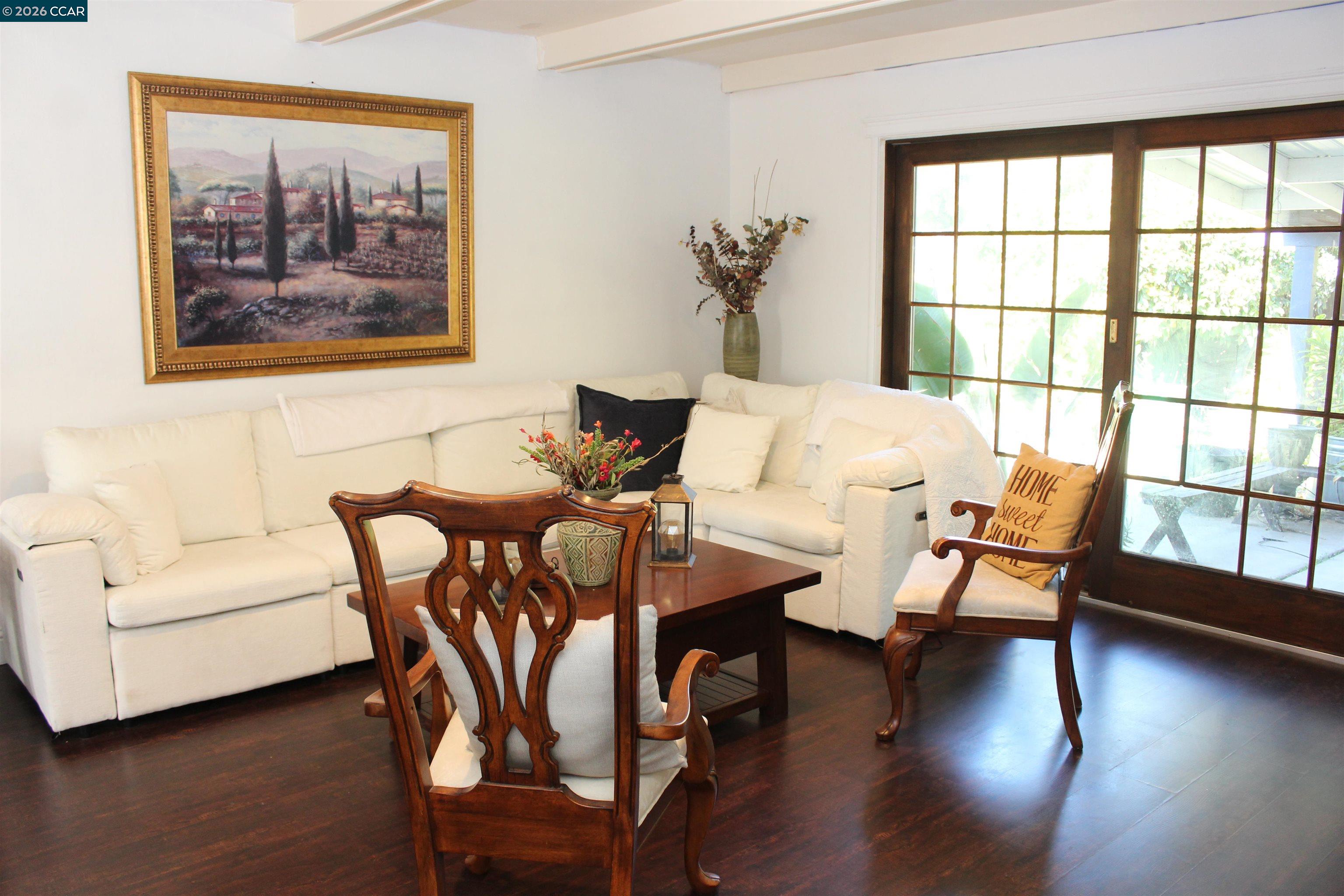 330 West Cypress Road Oakley, CA 94561 - Photo 15 of 59 a living room with furniture and a large window with wooden floor