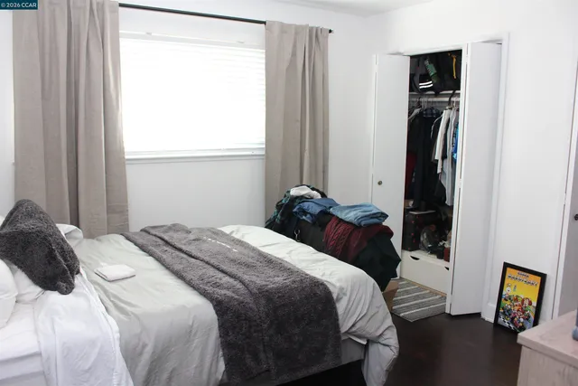a view of kitchen with a sink and wooden floor