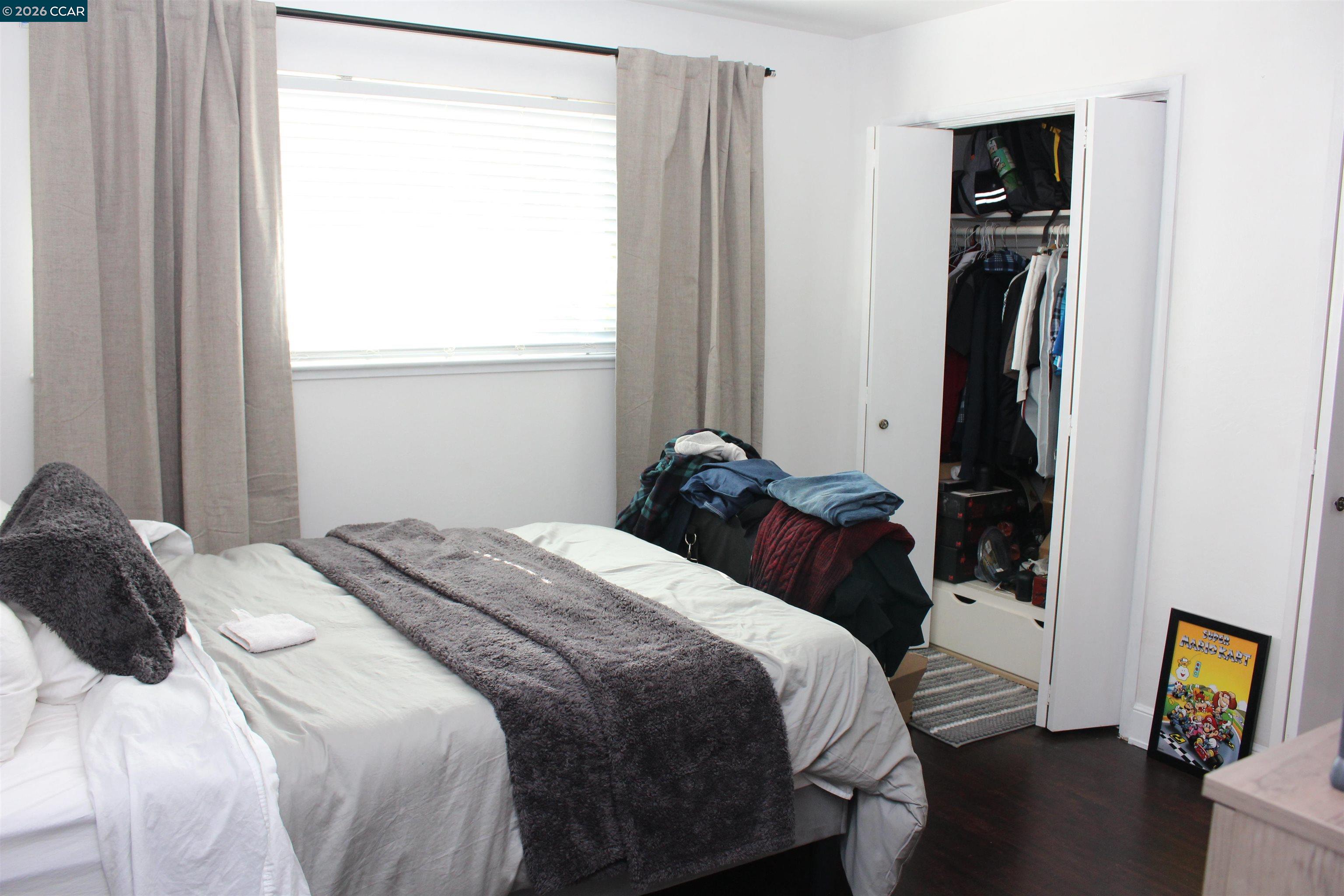 330 West Cypress Road Oakley, CA 94561 - Photo 30 of 59 a bedroom with a bed and a window