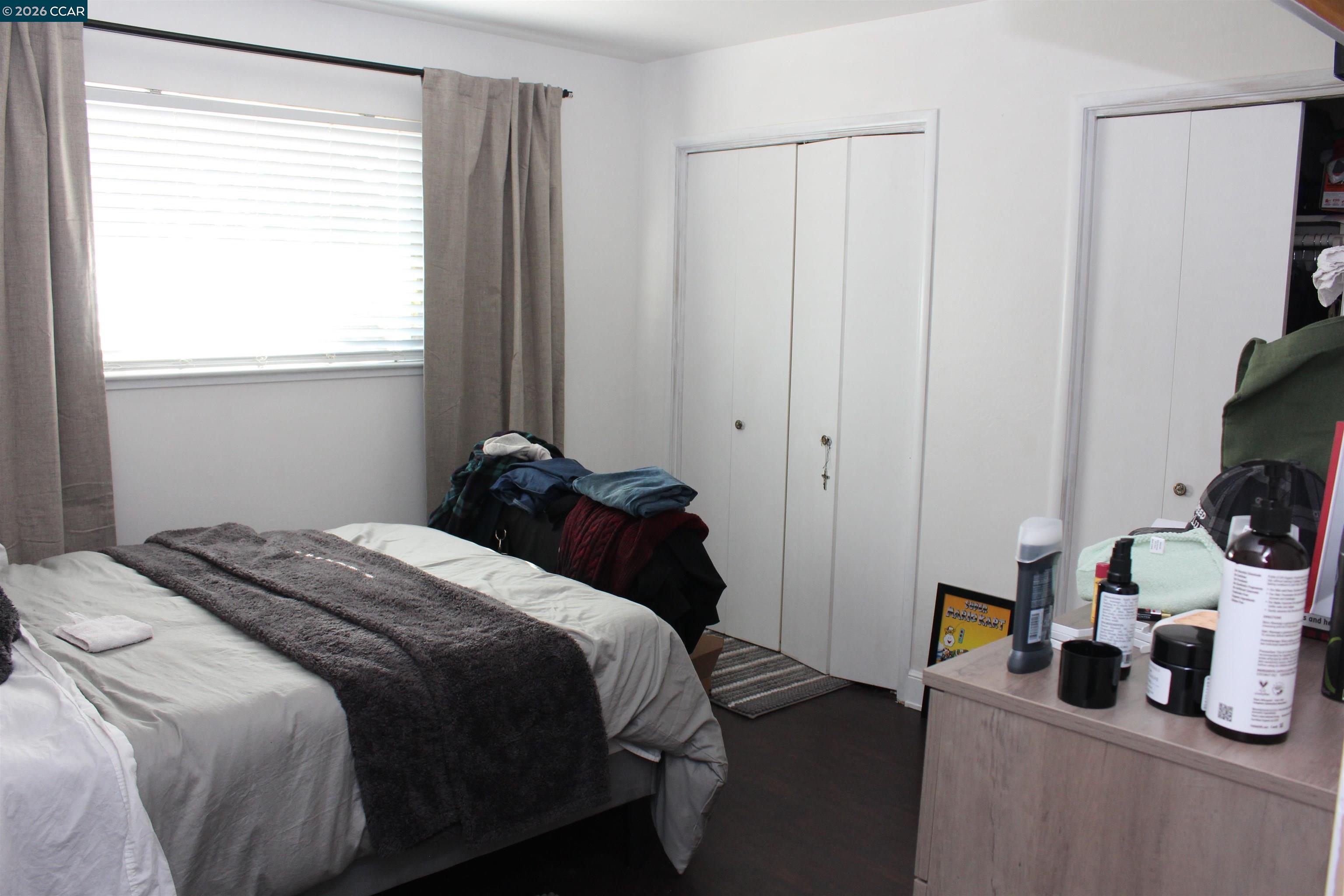 330 West Cypress Road Oakley, CA 94561 - Photo 31 of 59 a bedroom with a bed and a window