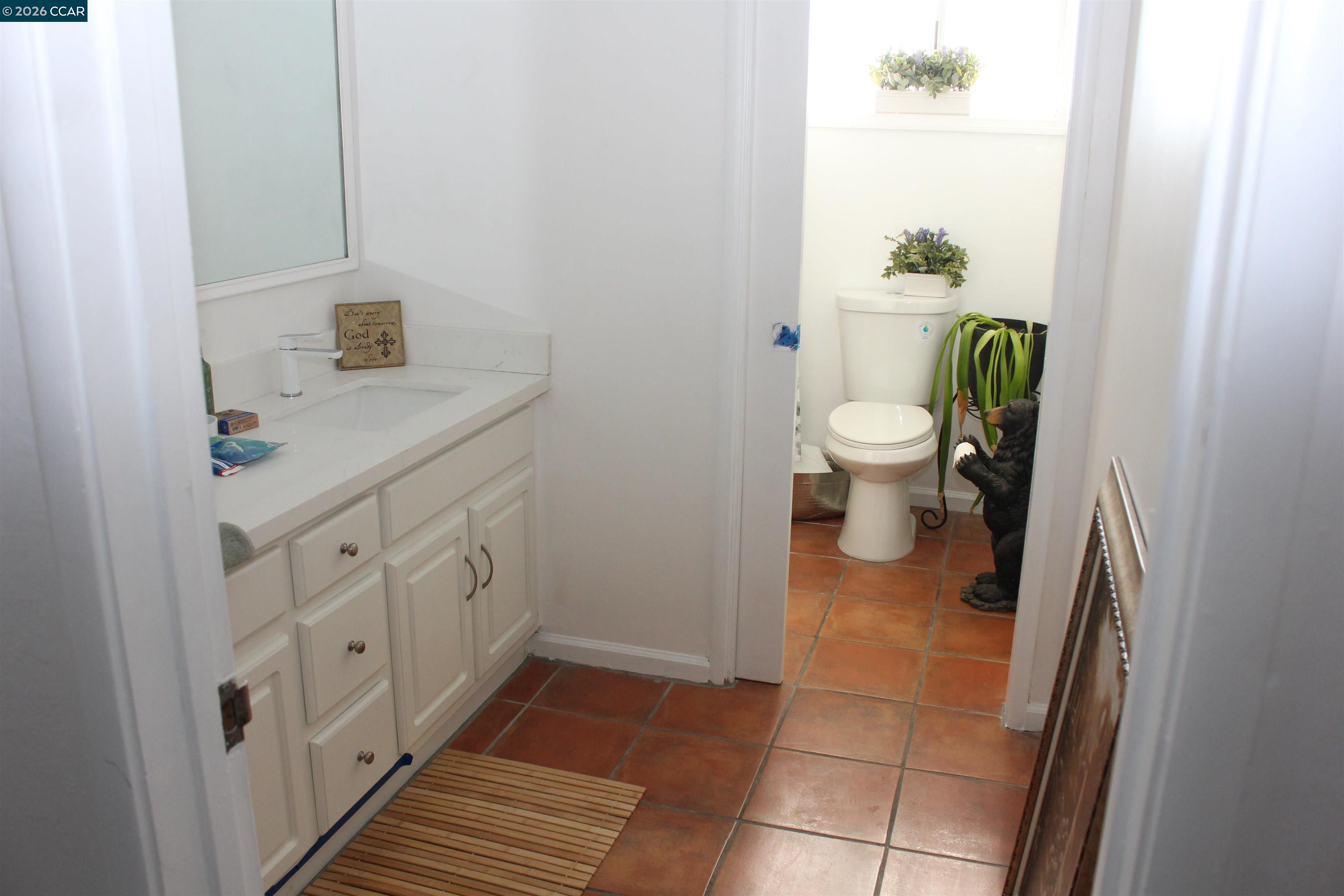 330 West Cypress Road Oakley, CA 94561 - Photo 37 of 59 a bathroom with a sink and a toilet