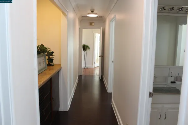 a view of an chairs and table in a balcony