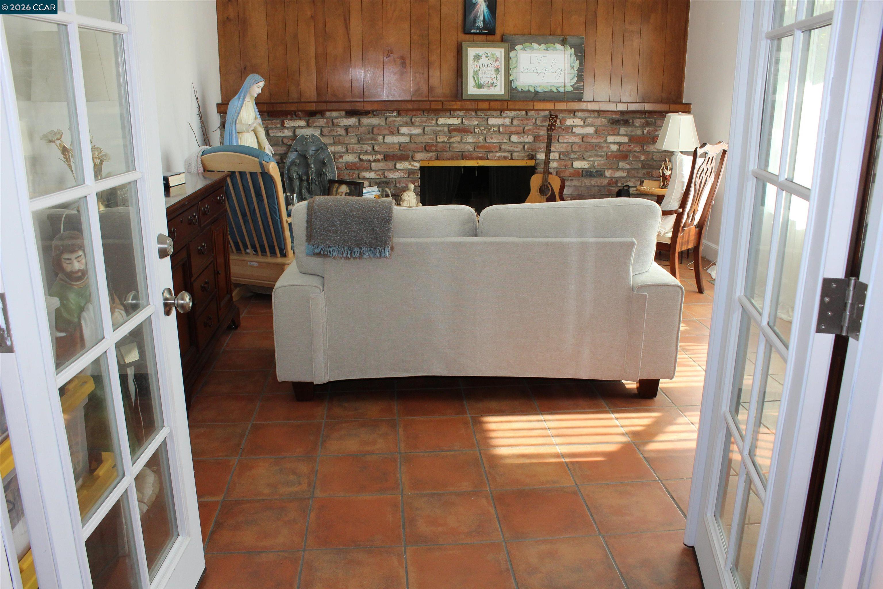 330 West Cypress Road Oakley, CA 94561 - Photo 9 of 59 a living room with furniture and a fireplace