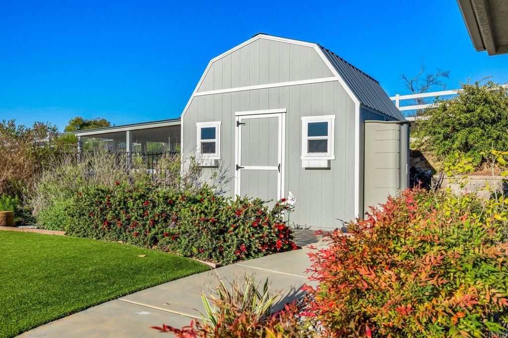 28623 Willow Park Road Escondido, CA 92026 - Photo 15 of 21 a view of a house with a yard