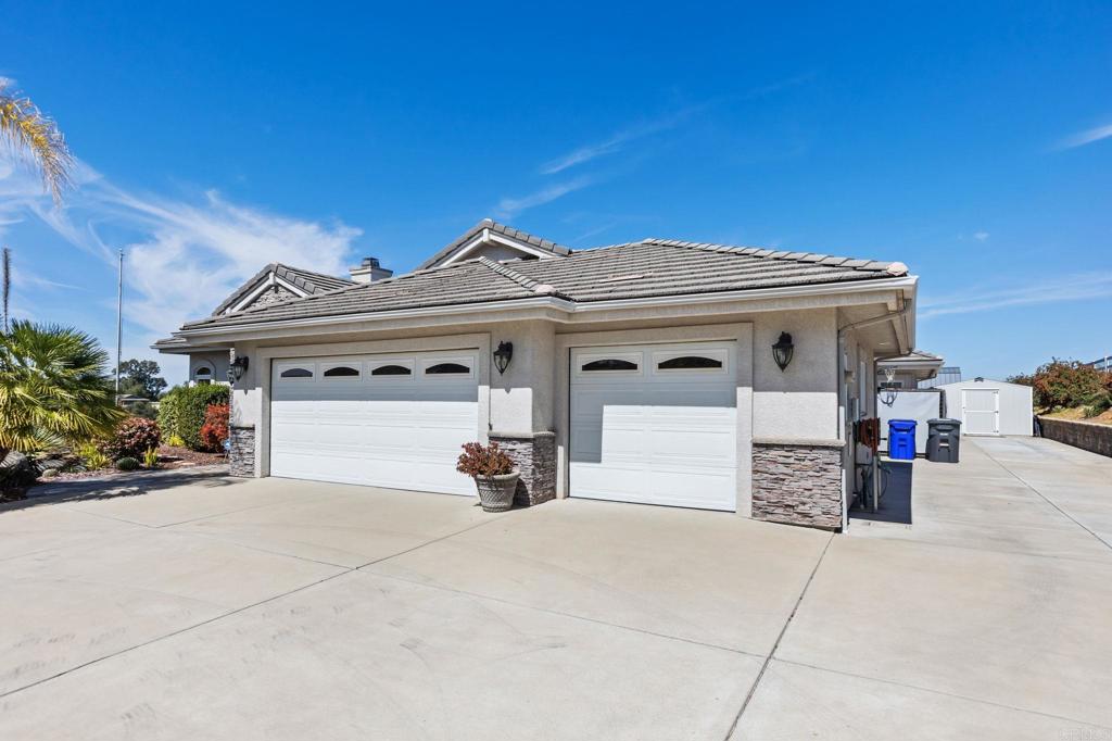 28623 Willow Park Road Escondido, CA 92026 - Photo 17 of 21 a view of a white house with a outdoor space