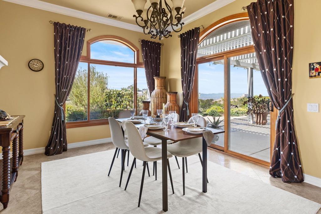 28623 Willow Park Road Escondido, CA 92026 - Photo 20 of 21 a view of a dining room with furniture window and outside view