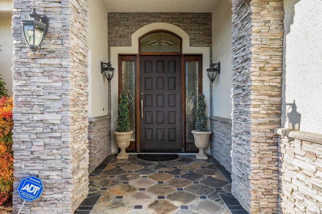 28623 Willow Park Road Escondido, CA 92026 - Photo 2 of 21 a view of a door with brick walls