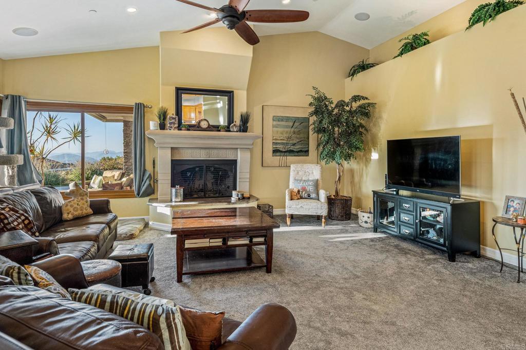 28623 Willow Park Road Escondido, CA 92026 - Photo 9 of 21 a living room with furniture and a flat screen tv