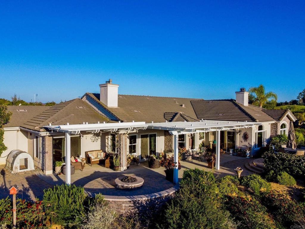 28623 Willow Park Road Escondido, CA 92026 - Photo 10 of 21 a view of a house with garden and patio