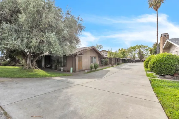 a house view with a garden space