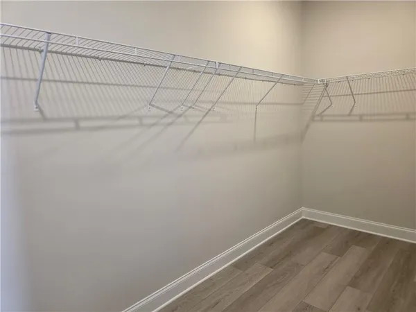 a view of a room with racks on the wall