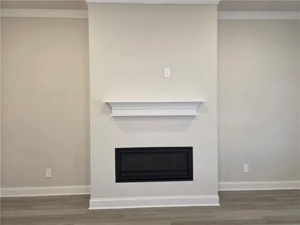 a view of white house with a fireplace