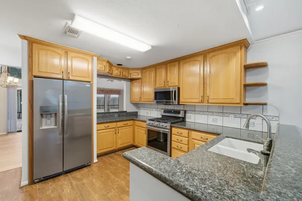 $486,000 | 25 North Mossrock Road, The Woodlands, TX 77380