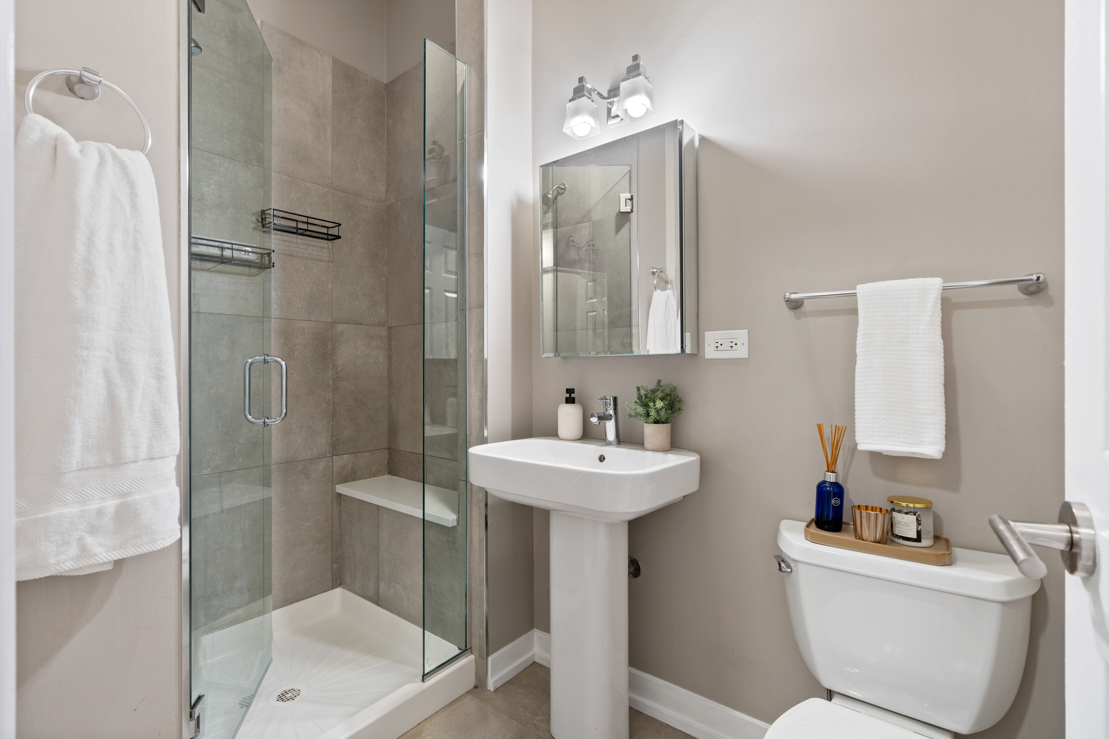 1816 West Division Street, Unit 2S Chicago, IL 60622 - Photo 13 of 16 a bathroom with a sink toilet and shower