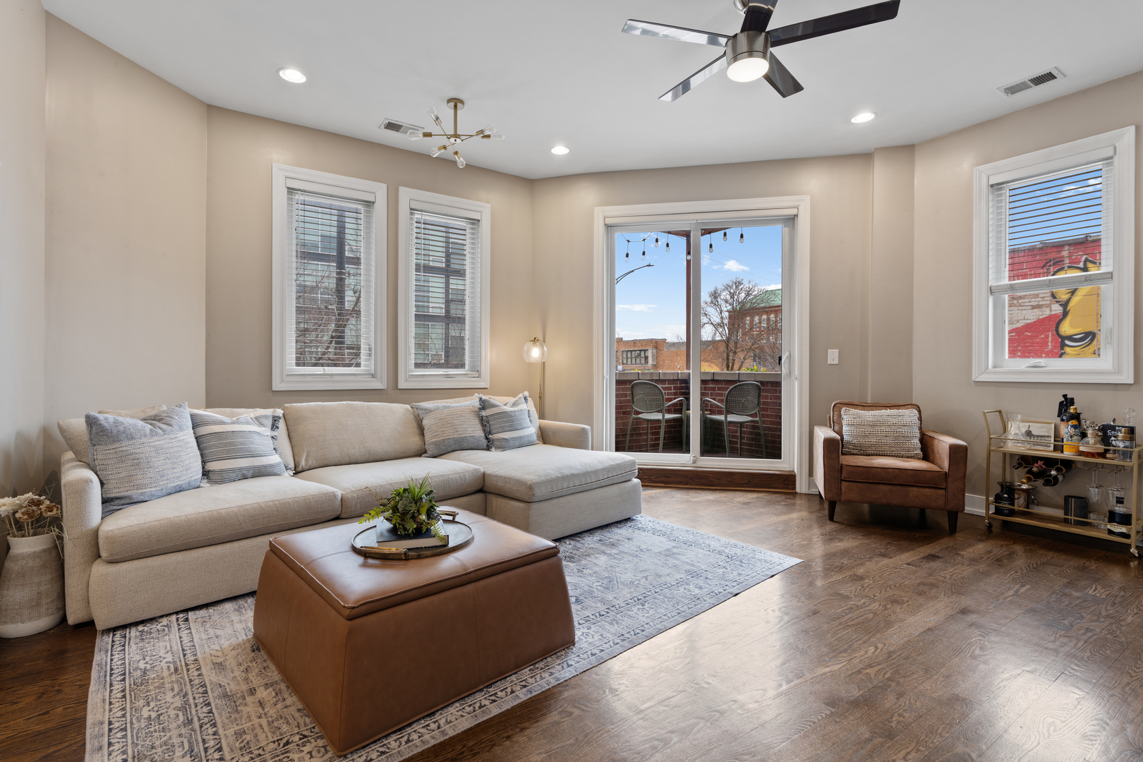 1816 West Division Street, Unit 2S Chicago, IL 60622 - Photo 6 of 16 a living room with furniture and a large window