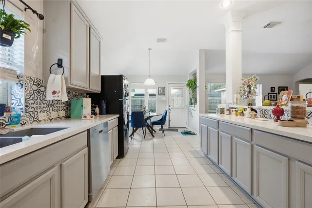 a bedroom with a bed and a book shelf