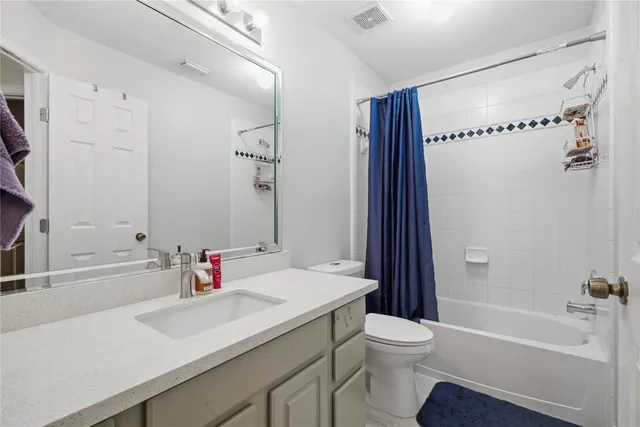 a view of a dining room with furniture and window