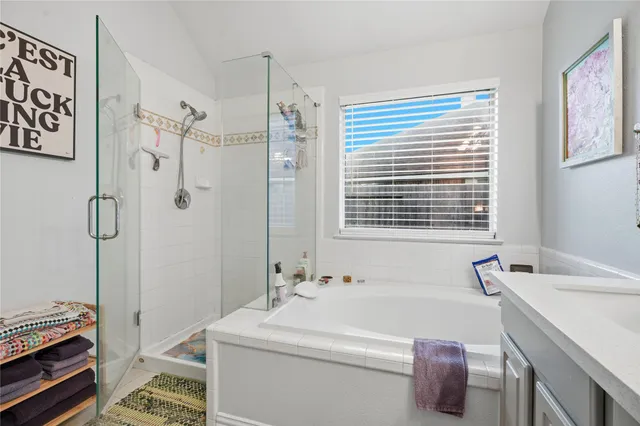 a view of a porch with dining table and chairs with potted plants