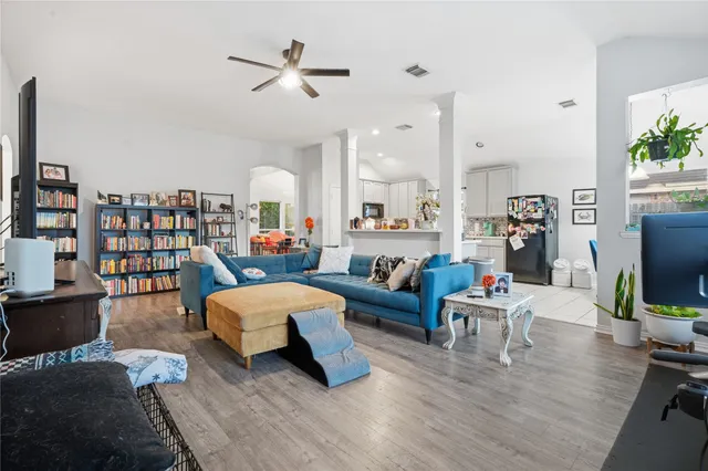 a kitchen with stainless steel appliances a stove refrigerator sink and microwave