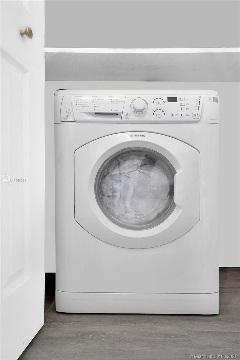734 Meridian Avenue, Unit 4 Miami Beach, FL 33139 - Photo 8 of 12 a close up view of washer and dryer