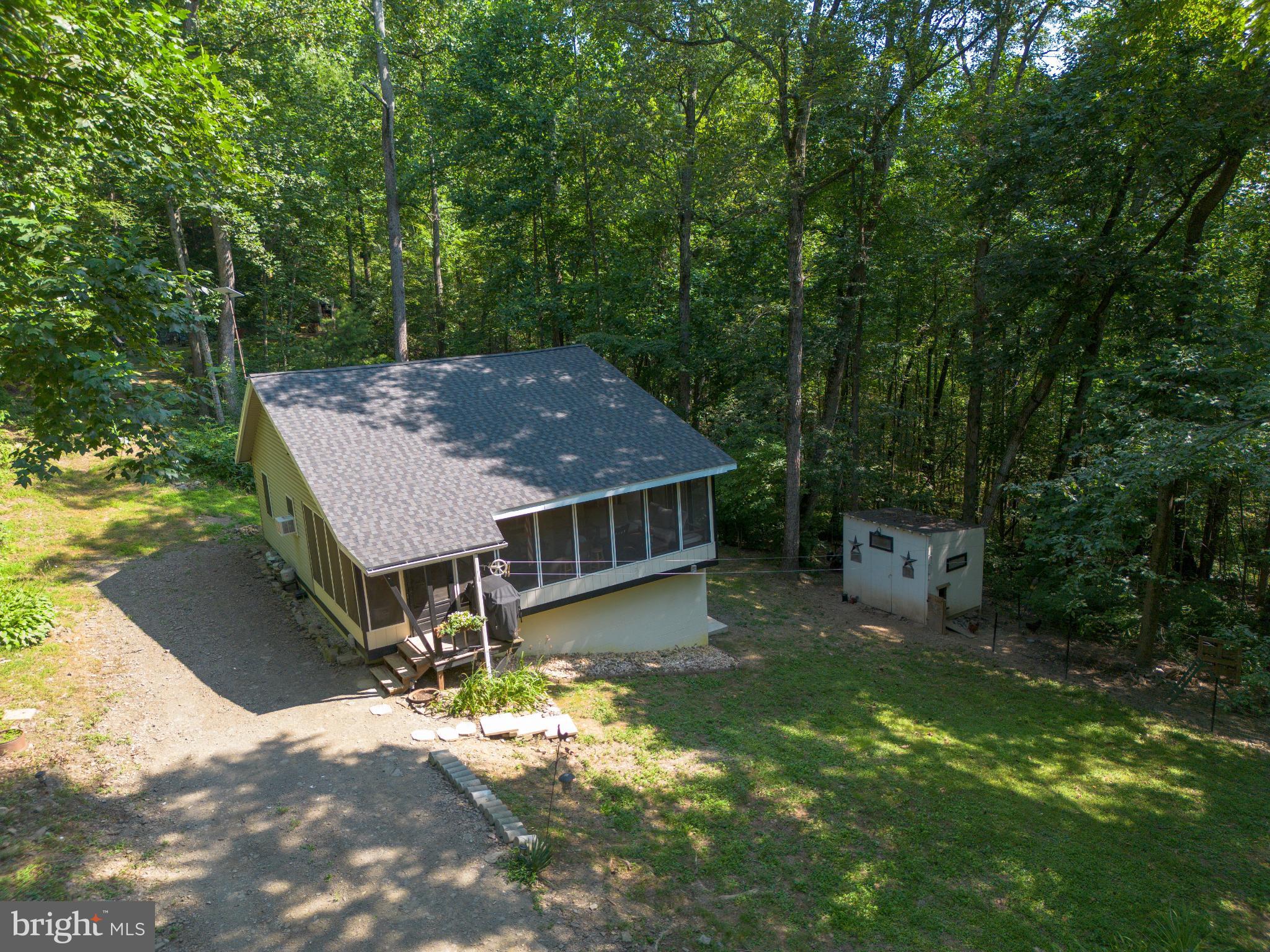398 Acorn Road Millerstown, PA 17062 - Photo 1 of 42 Charming retreat nestled in lush greenery.