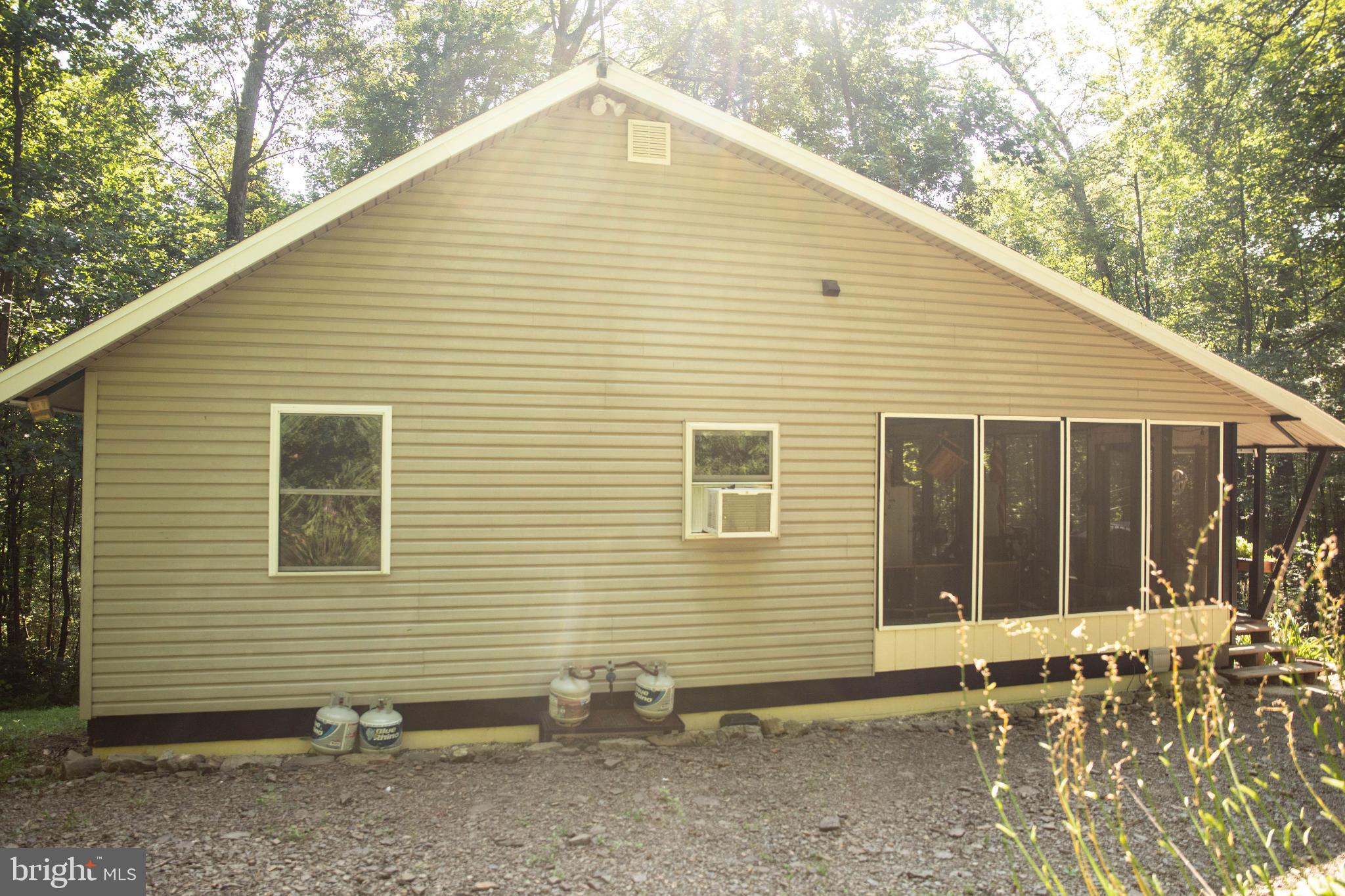 398 Acorn Road Millerstown, PA 17062 - Photo 14 of 42 Serene retreat nestled in nature's embrace.