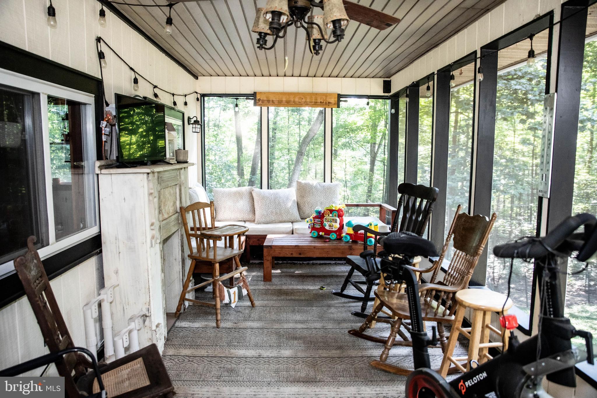 398 Acorn Road Millerstown, PA 17062 - Photo 20 of 42 Serene screened porch with nature views.