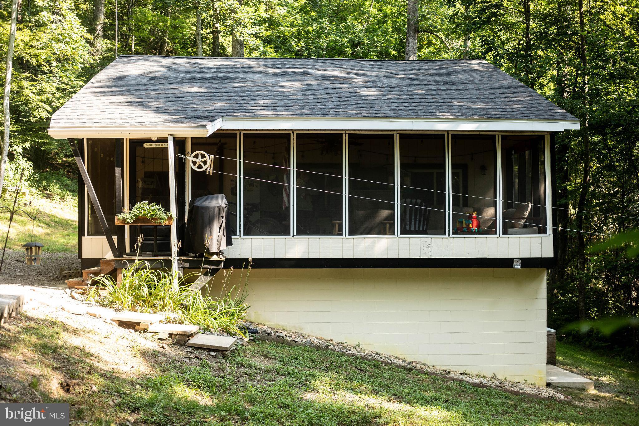 398 Acorn Road Millerstown, PA 17062 - Photo 3 of 42 Charming retreat nestled in lush greenery.