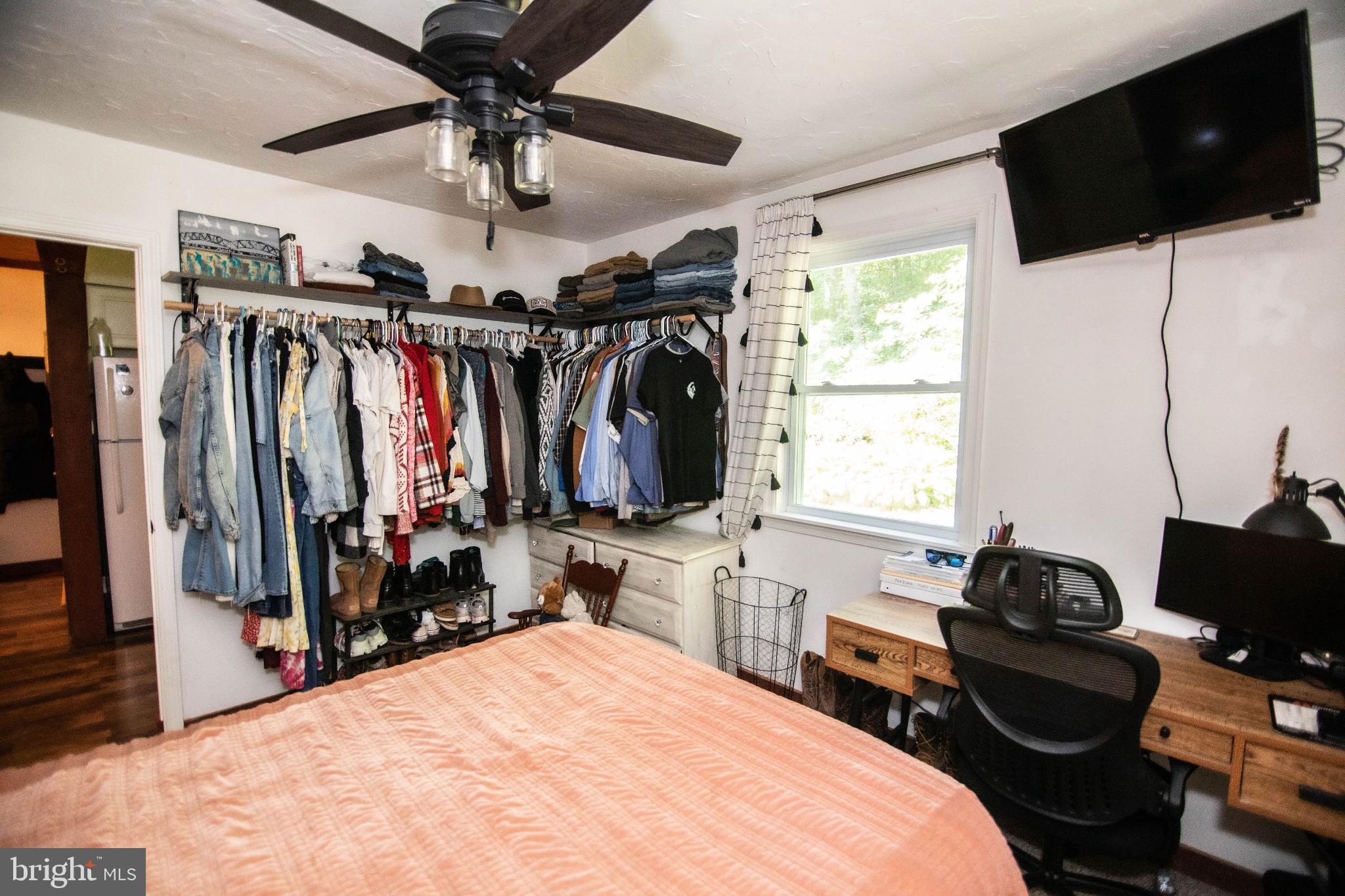 398 Acorn Road Millerstown, PA 17062 - Photo 35 of 42 Cozy bedroom with organized closet space.