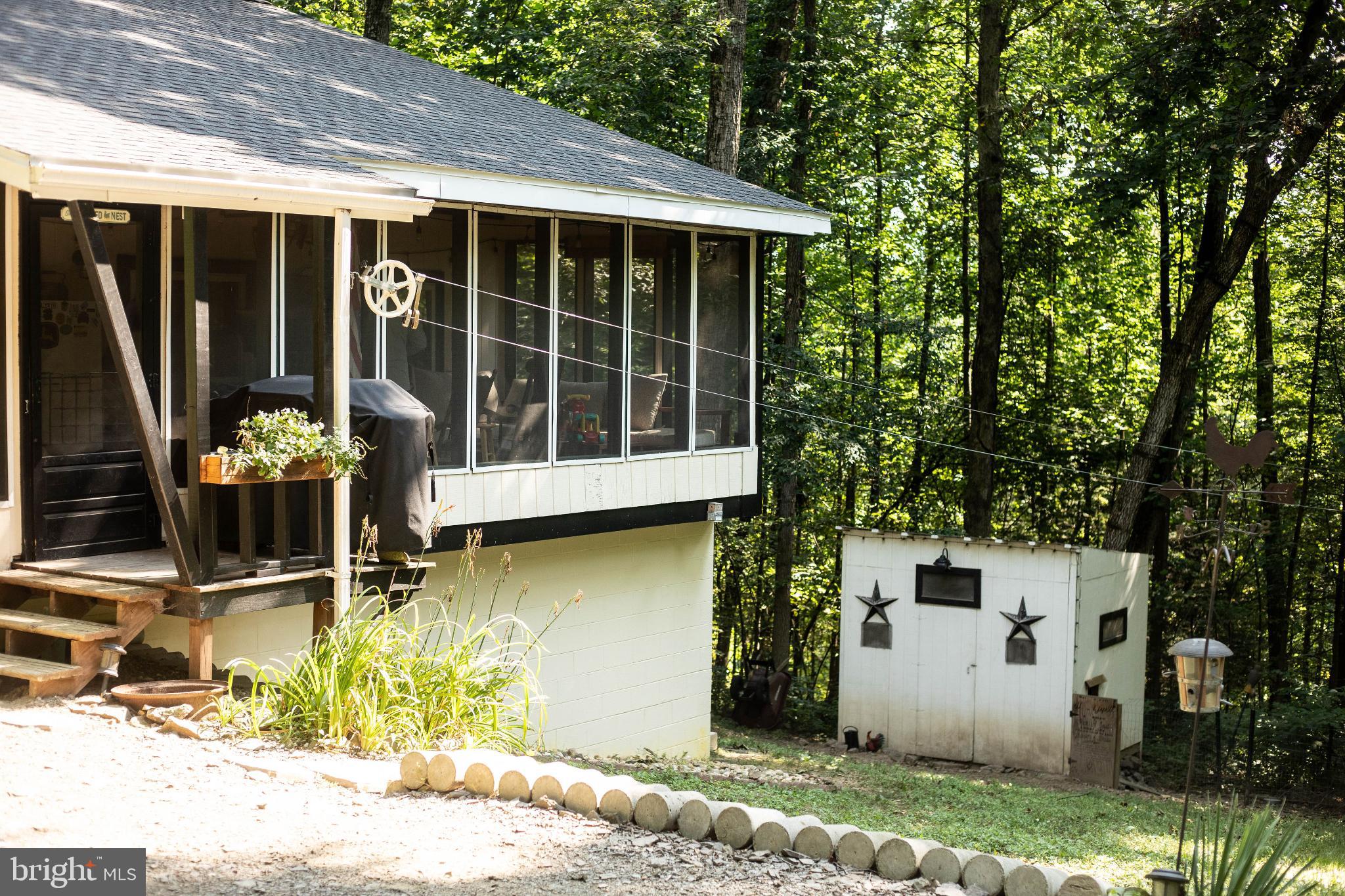 398 Acorn Road Millerstown, PA 17062 - Photo 4 of 42 Charming retreat nestled in lush greenery.