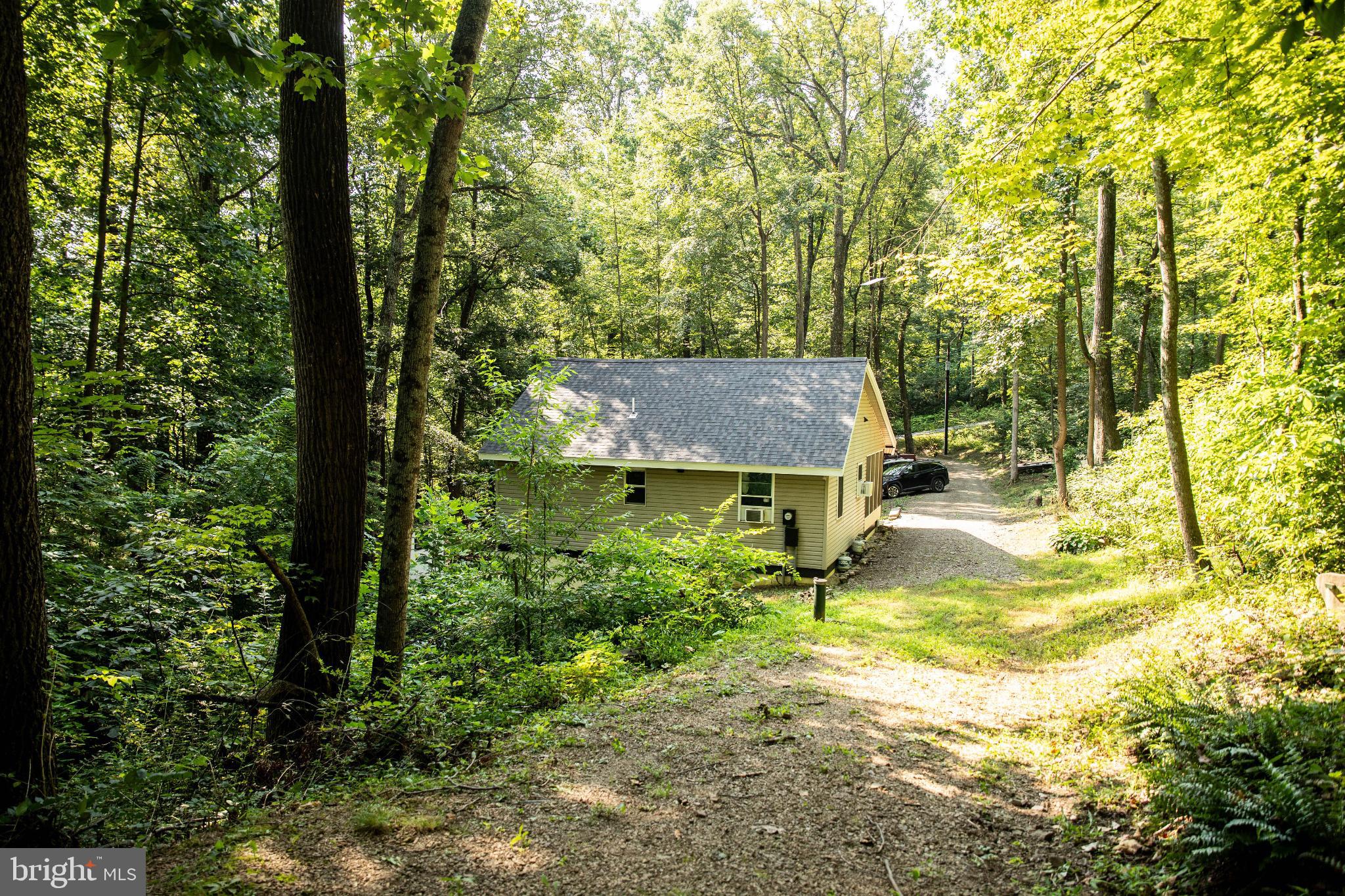 398 Acorn Road Millerstown, PA 17062 - Photo 8 of 42 Secluded retreat nestled in lush greenery.