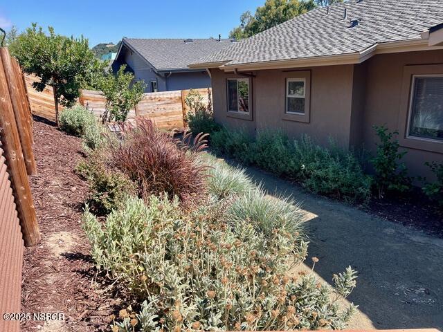 0 Old Mission Drive Solvang, CA 93463 - Photo 23 of 68 a view of a back yard with a lot of flower plants