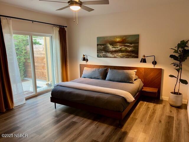 0 Old Mission Drive Solvang, CA 93463 - Photo 42 of 68 a bedroom with a bed and wooden floor