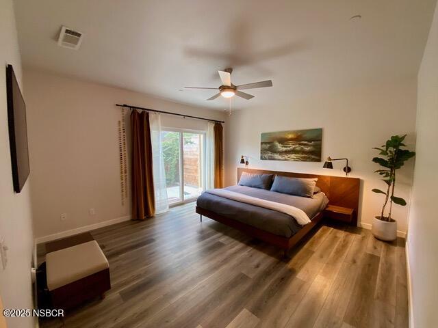 0 Old Mission Drive Solvang, CA 93463 - Photo 43 of 68 a bedroom with a bed and wooden floor