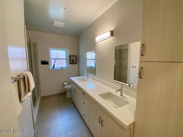 0 Old Mission Drive Solvang, CA 93463 - Photo 46 of 68 a bathroom with double vanity sink and mirror