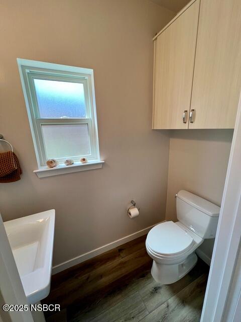 0 Old Mission Drive Solvang, CA 93463 - Photo 52 of 68 a bathroom with a toilet a sink and mirror