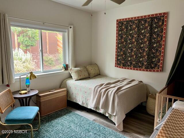 0 Old Mission Drive Solvang, CA 93463 - Photo 65 of 68 a bedroom with a bed and wooden floor