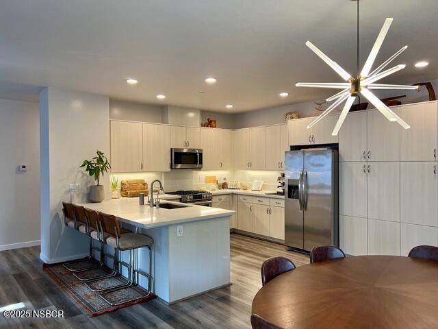 0 Old Mission Drive Solvang, CA 93463 - Photo 68 of 68 a kitchen with kitchen island granite countertop a sink stainless steel appliances and cabinets