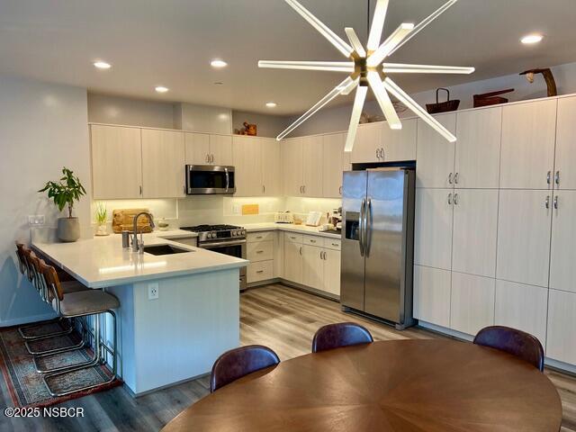 0 Old Mission Drive Solvang, CA 93463 - Photo 10 of 68 a kitchen with kitchen island granite countertop a sink stainless steel appliances and cabinets