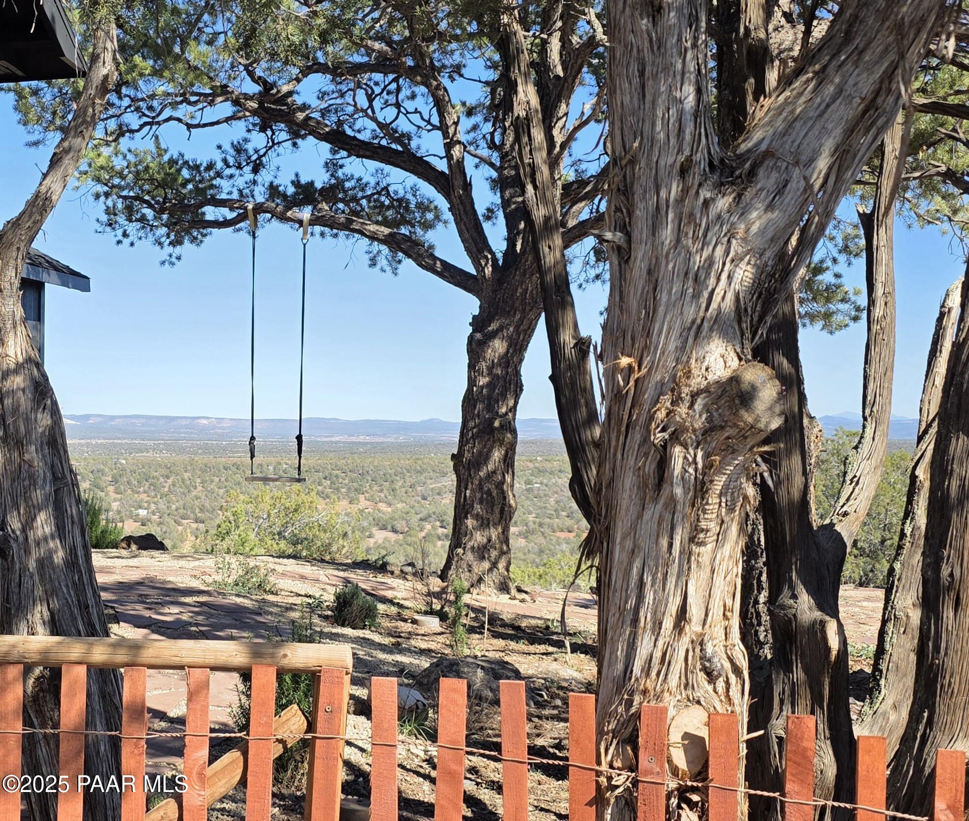 8200 West Rolling Ridge Road Ash Fork, AZ 86320 - Photo 3 of 38 a view of a yard with a tree