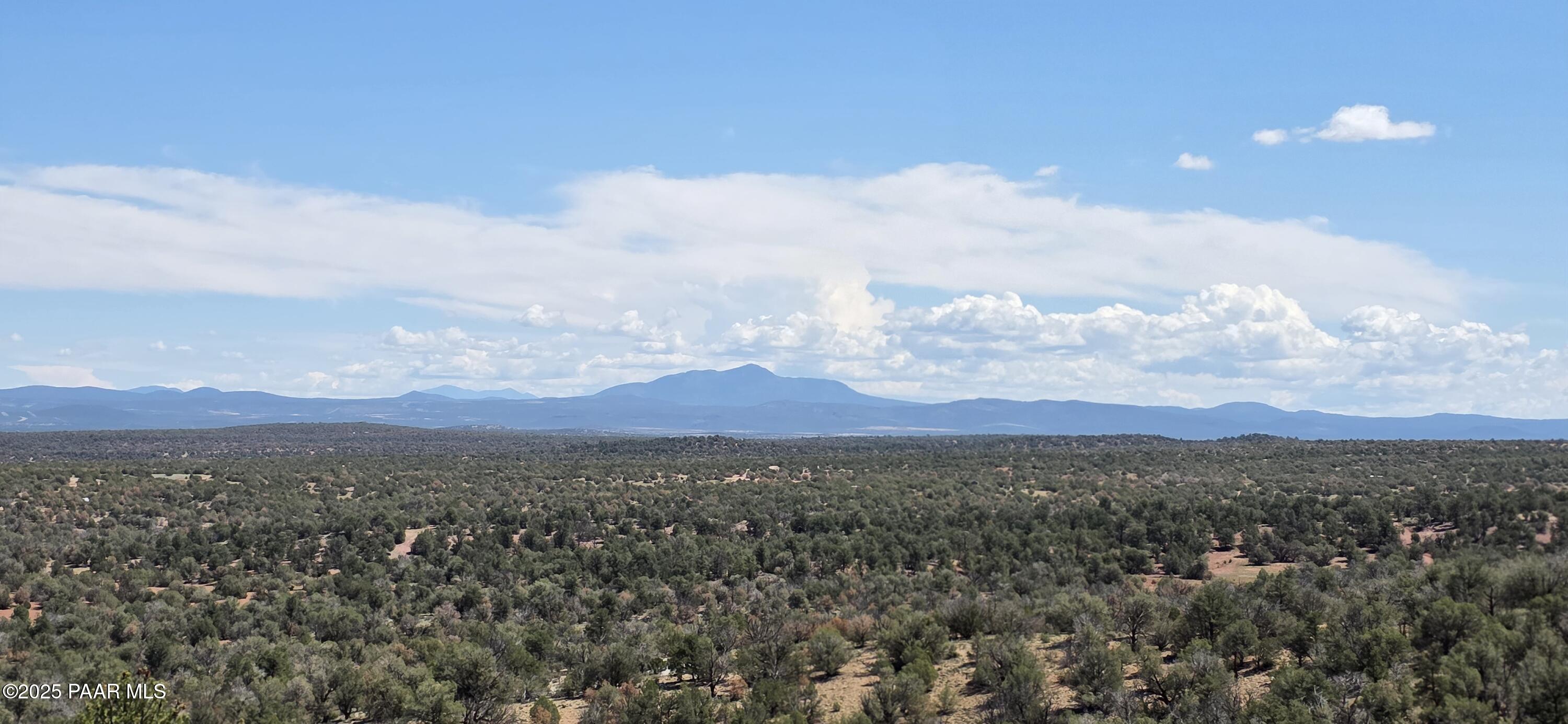 8200 West Rolling Ridge Road Ash Fork, AZ 86320 - Photo 5 of 38 a view of a city and mountains