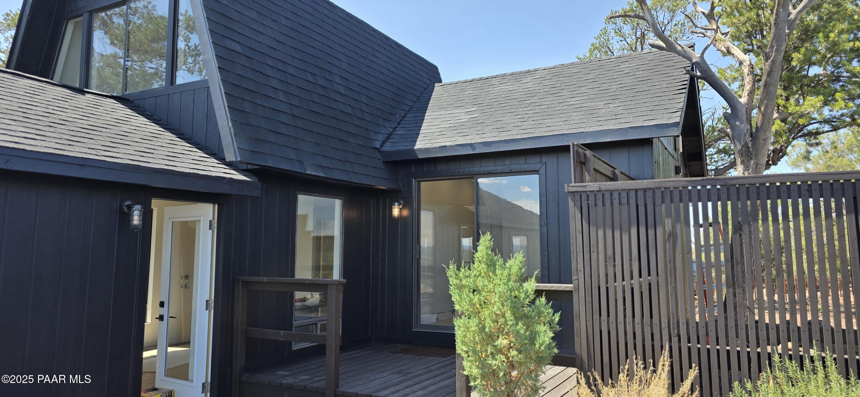 8200 West Rolling Ridge Road Ash Fork, AZ 86320 - Photo 8 of 38 a front view of a house having yard