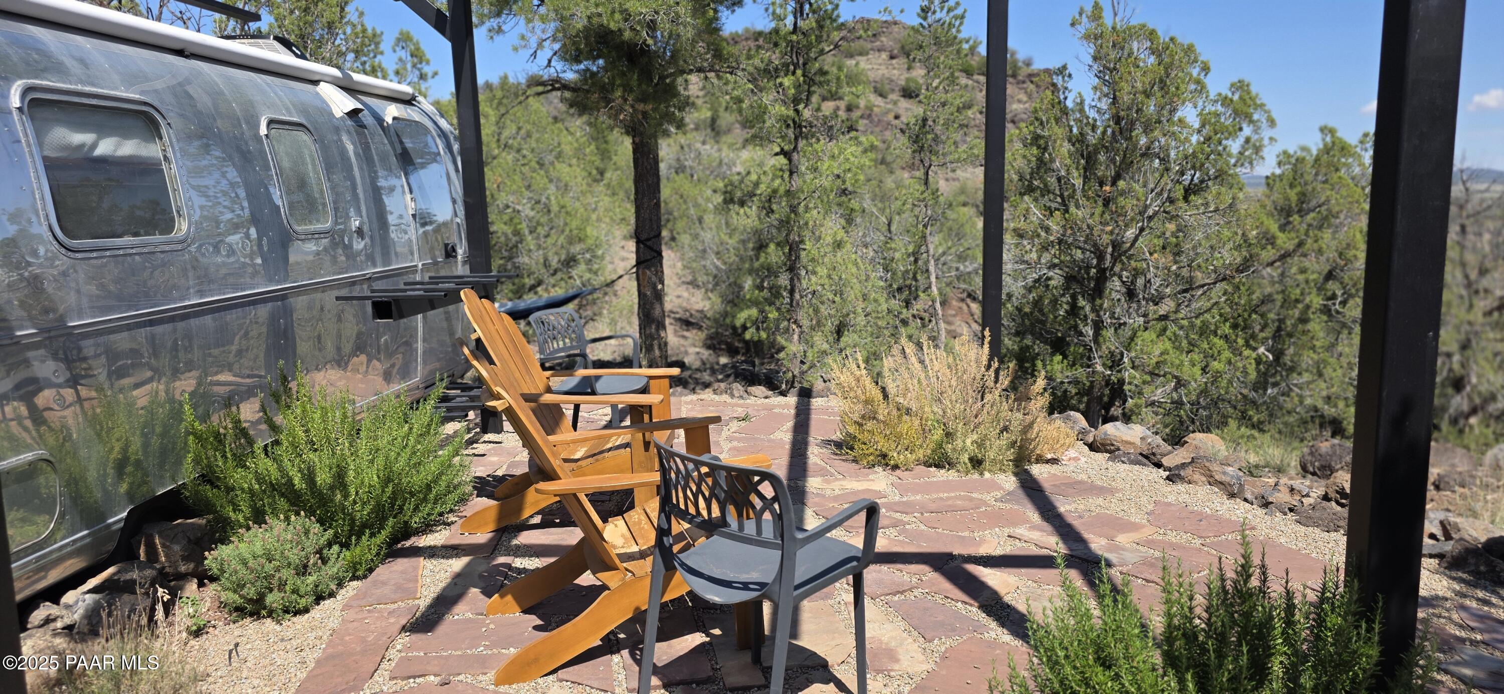 8200 West Rolling Ridge Road Ash Fork, AZ 86320 - Photo 10 of 38 a view of an outdoor space and seating area