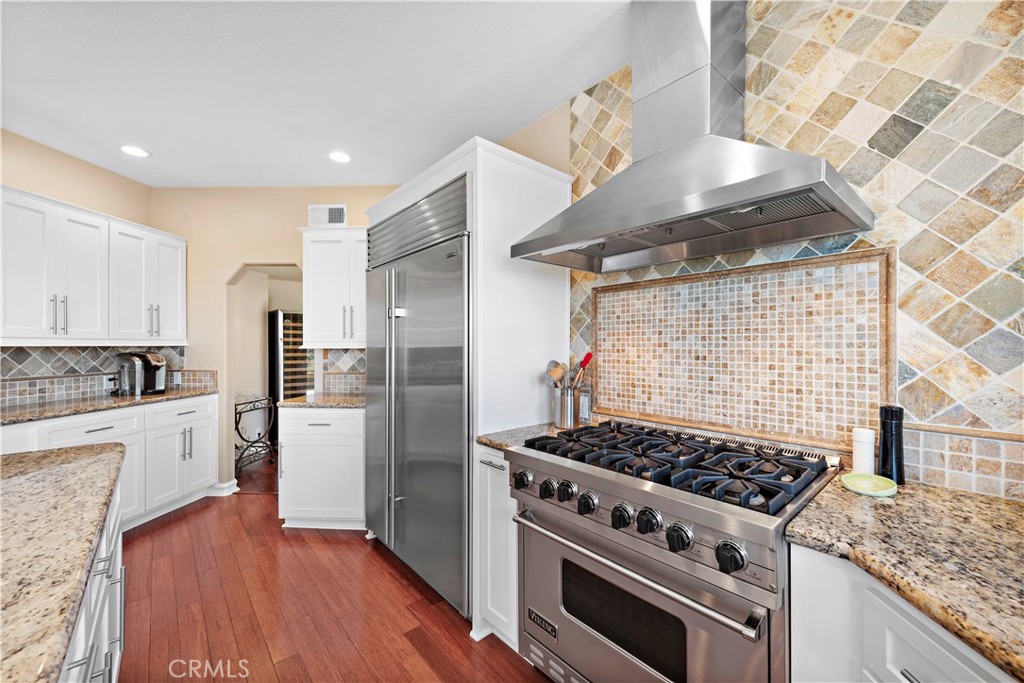 4 Via Goleta San Clemente, CA 92673 - Photo 17 of 70 a kitchen with stove and refrigerator
