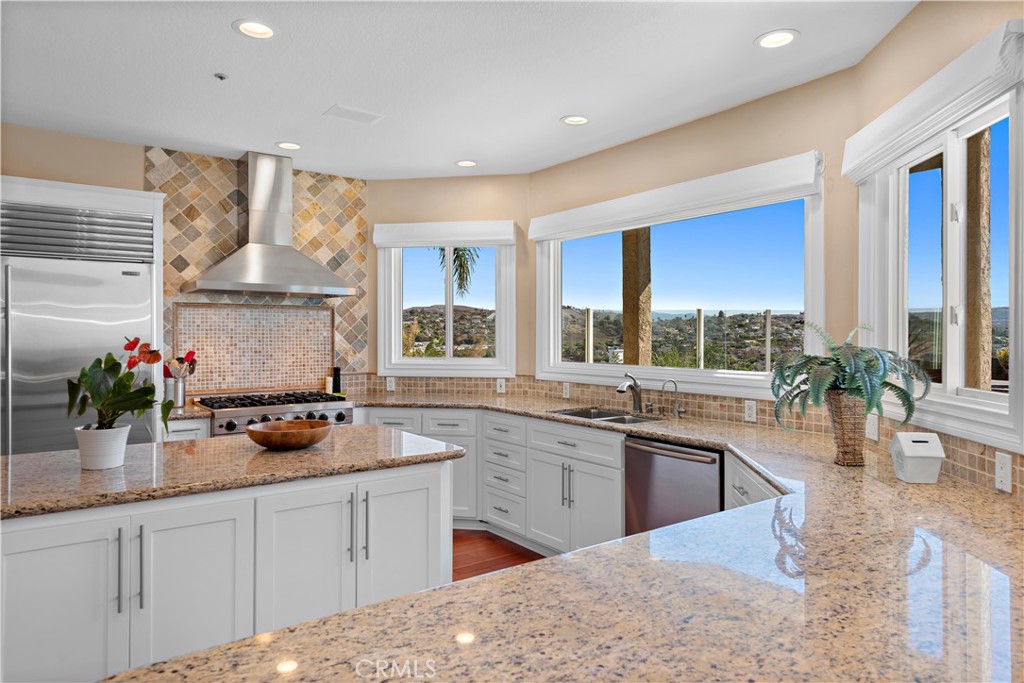 4 Via Goleta San Clemente, CA 92673 - Photo 23 of 70 a kitchen with sink refrigerator and large window