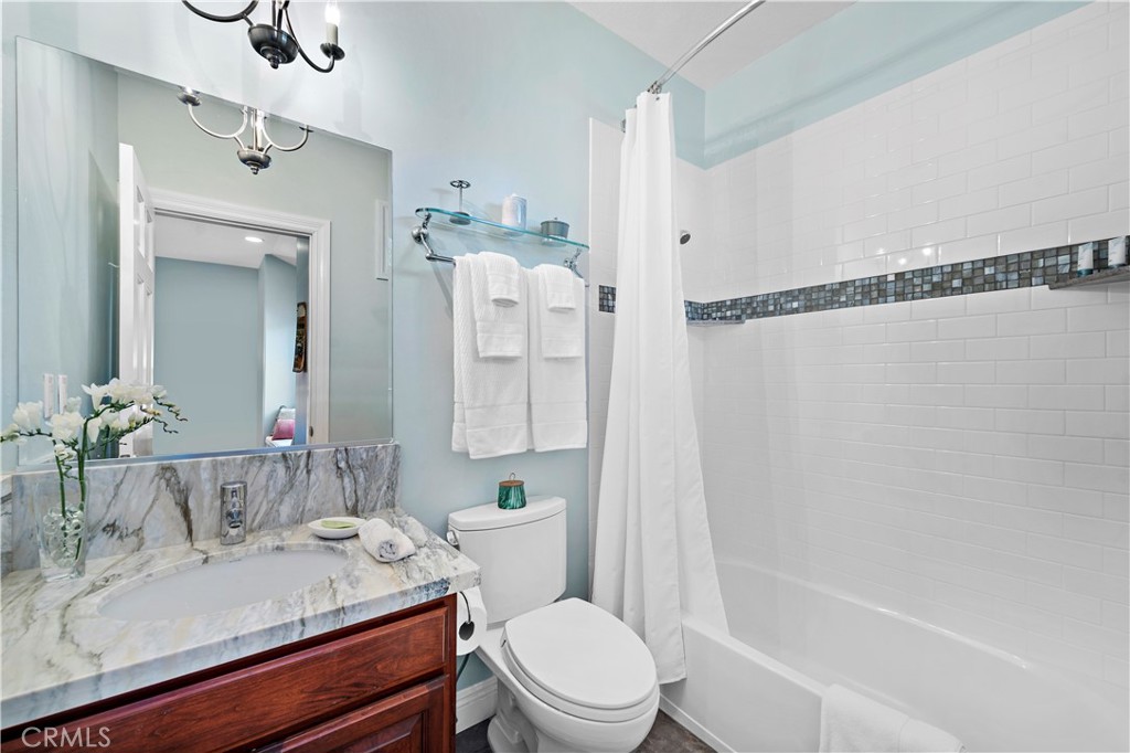 4 Via Goleta San Clemente, CA 92673 - Photo 41 of 70 a bathroom with a sink vanity granite toilet tub and shower