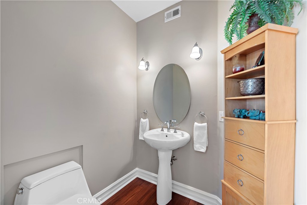 4 Via Goleta San Clemente, CA 92673 - Photo 47 of 70 a bathroom with a sink toilet and a mirror