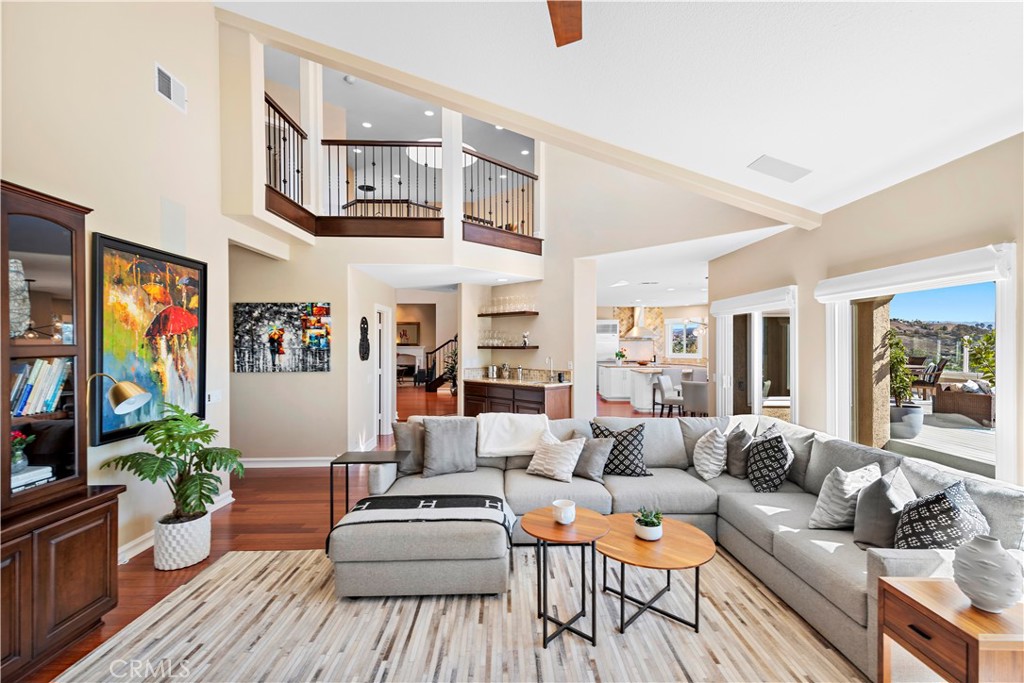 4 Via Goleta San Clemente, CA 92673 - Photo 49 of 70 a living room with furniture and painting on the wall next to a window