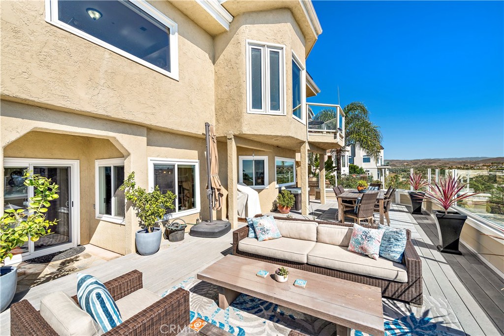 4 Via Goleta San Clemente, CA 92673 - Photo 56 of 70 a view of a patio with couches table and chairs